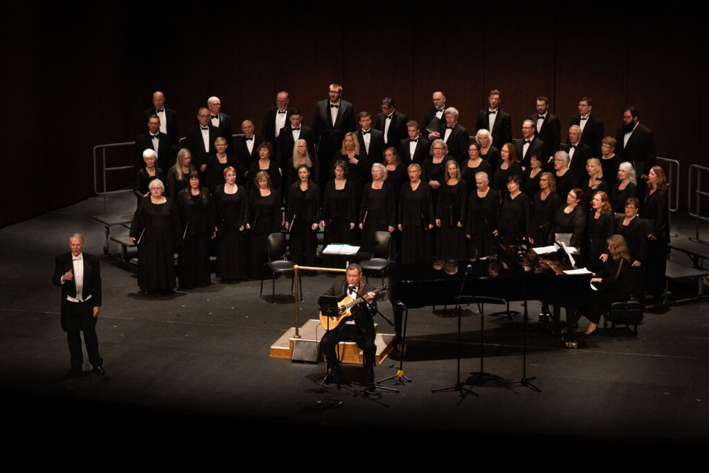 Legacy Chorale performance on stage at Gitchi Zibi in Brainerd Minnesota under the direction of Michael Smith