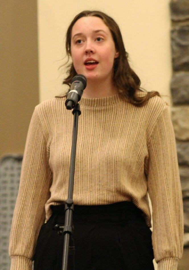 Lillian March 2023 Scholarship Winner singing at a concert